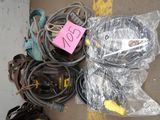 a lot of wires and cords on the ground