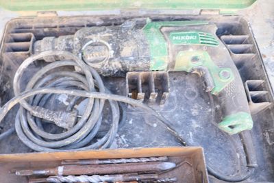 a tool that is sitting in a box on the ground
