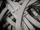 black and white photograph of a bunch of old wooden pieces