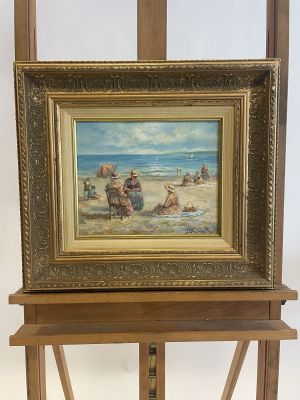 an oil painting of a beach scene on a wooden easel