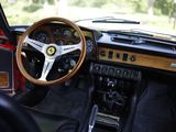 dashboard of a car with a steering wheel and dashboard controls