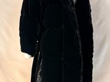 black velvet coat with fur collar and cuffs on a mannequin mannequin mannequin mannequin mannequin mannequin mannequin mann