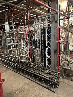 many scaffoldings in a building that is under construction