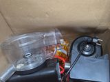 a box with a blender, a blender, and other items in it