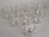 a lot of glasses that are sitting on a table