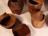 a group of baskets sitting on a table next to each other