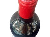 a bottle of wine that is sitting on a table