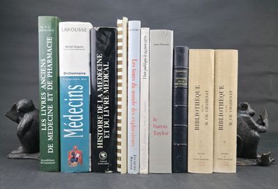 a bunch of books that are sitting on a shelf