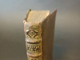 an old book sitting on top of a table