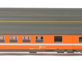 two train cars sitting side by side on a white surface