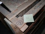 several pieces of wood sitting on top of a wooden pallet