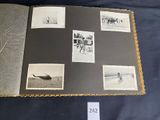 an open book with pictures of people and animals on it