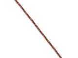 a close up of a purple and gold bracelet on a white background