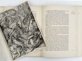 a book open to a drawing of a group of animals