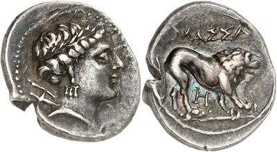 a silver coin with an image of a lion on it