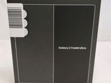 a close up of the back of a black box with a barcode on it