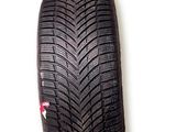 a close up of a tire on a white surface