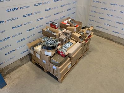 a pile of boxes of assorted items on a pallet