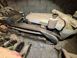 an image of a car that has been left in the garage