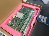 a pink box with a motherboard inside of it