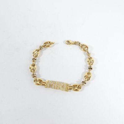 un bracelet plaqué or composé d'une barre et de perles