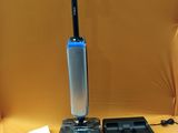 a vacuum that is sitting on top of a table