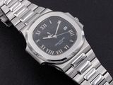 a silver watch with roman numerals on the bracelet
