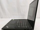 the back of a laptop computer sitting on top of a white surface