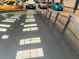 many cars that are parked in the parking lot