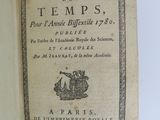 an open book with a picture of a bird on it