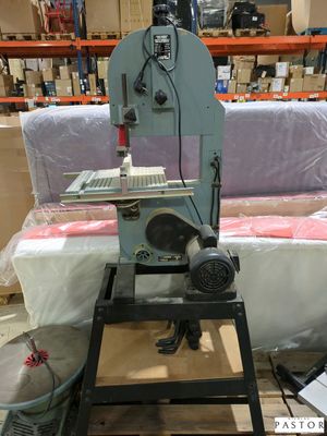 the machine is sitting on the table in the warehouse