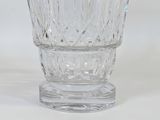 a glass vase that is sitting on a table