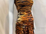 an image of a mannequin dressed in a tiger print dress
