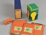 two boxes of cigarettes and a box of matches on a table