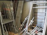 many metal bars stacked up in a storage area