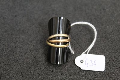 a ring that is sitting on top of a ring holder