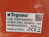 a label on the back of a bottle of orange liquid