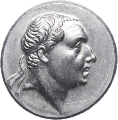 an old coin with a woman ' s head on it ' s side
