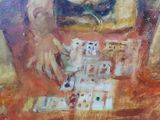 a painting of a woman playing cards on a table