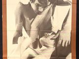 french movie poster of a naked man cutting a woman ' s hair