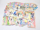 a pile of children ' s books on a table