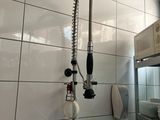 a kitchen sink with a faucet and a sink in it