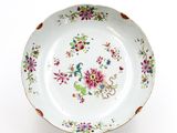 an image of a white plate with a floral design on it