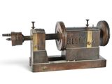 an old model of a sewing machine on a white background