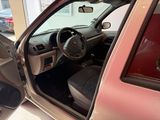 a car that is sitting in a car showroom with its door open