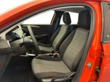 a red car with two seats in the back of it
