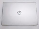 hp laptop computer sitting on top of a white table with a logo on the screen