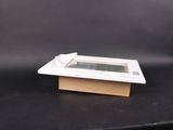 a picture of a small box with a window in it