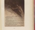 un livre ouvert sur lequel figure l'image d'une femme nue
