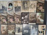 a lot of old postcards that are on the wall